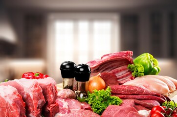 Tasty fresh meat raw steaks on  desk