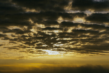 Horizon panorama and dramatic twilight sky and cloud sunset background. Natural sky background texture, beautiful color. Dark clouds, big storm and rain. Weather and nature concept.