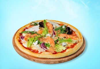 Delicious fresh pizza with vegetables on the desk