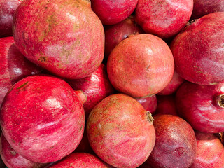 Close-up view of pomegranate on display at the supermarket.