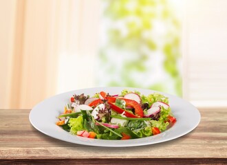 Caesar salad dish with fresh vegetables