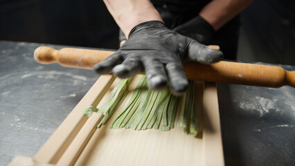  Green Spaghetti Creation On A Wooden Traditional Tool