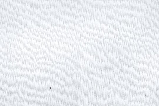Textured white batiste cotton fabric with subtle lines and patterns.