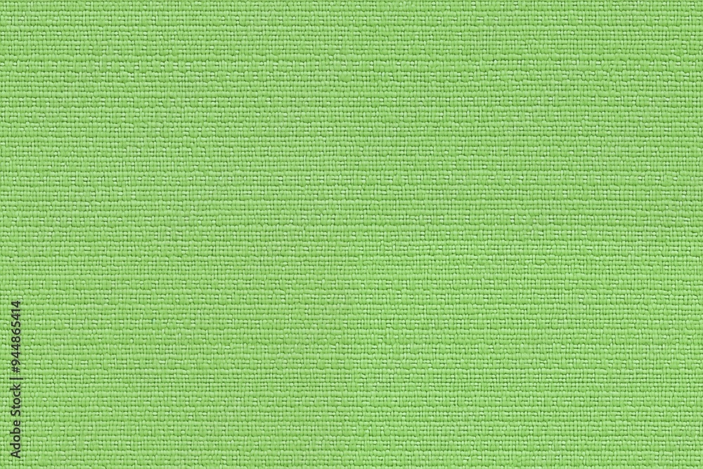 Poster textured green batiste cotton fabric, showcasing a vibrant and smooth surface. the fabric has a cons