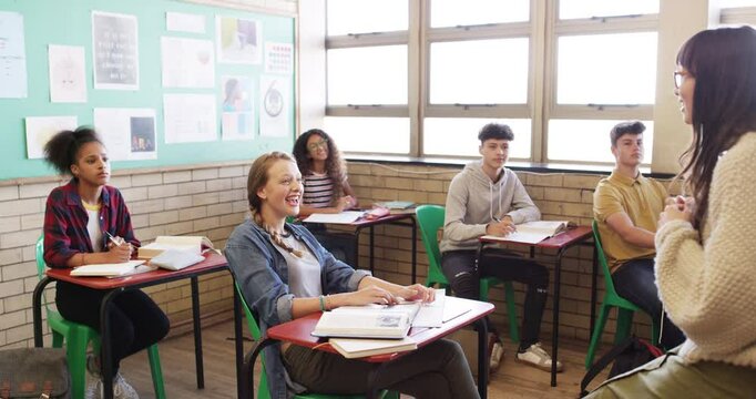 Happy woman, teacher and students applause in classroom for learning, education or future development at school. Proud female person or educator talking, teaching or teens clapping for class speech
