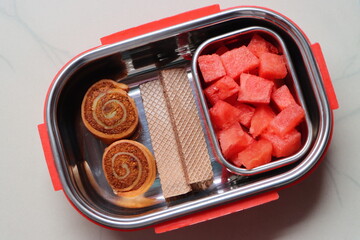 kids snack box for school, pinwheel samosa, fruits and waffle