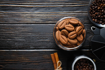 Cookies with coffee beans on a dark background