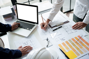 Engineer or interior Architects designer construction plans on blueprint