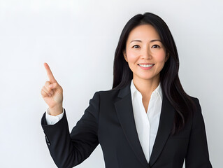 人差し指を立てているキャリアウーマン