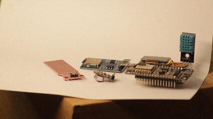 closeup of electronic iot circuit for learning with various sensors such as water, temperature, humidity with microcontroller microprocessor