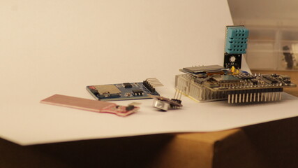 closeup of electronic iot circuit for learning with various sensors such as water, temperature, humidity with microcontroller microprocessor