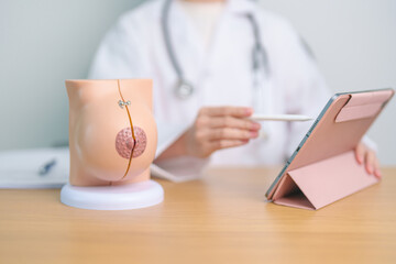Doctor with Breast Anatomy model. Breast Augmentation Surgery, October Breast Cancer Awareness...
