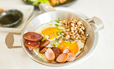 Close-Up Bread with Pan Fried Egg with Toppings, Thailand breakfast.