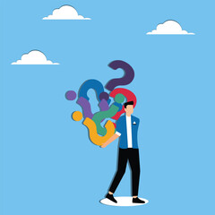 Man holding many question marks