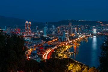 Obraz premium View of Izmir Bay in the evening from the high hill of Bayrakli. Long exposure, low light.