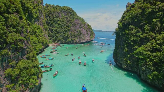 Aerial drone shot flying above Phi Phi islands landmark of Krabi, Thailand. 