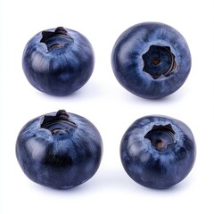 Obraz premium Four Blueberries Isolated on a White Background