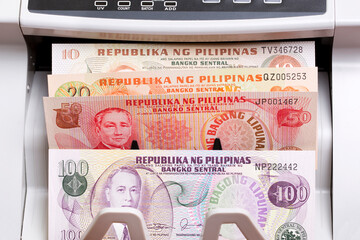 Philippine peso in the counting machine