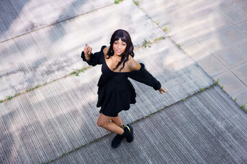 Cool dancer performing in the street in summer