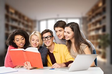 Group of students study materials in school library