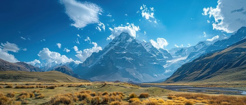 Majestic Snow-Capped Mountains Against a Clear Blue Sky