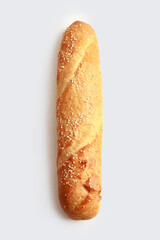 baguette sprinkled with sesame seeds on a white background