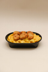 Mac and cheese tasty Italian pasta with Cheddar cheese on plain background