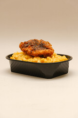 Mac and cheese tasty Italian pasta with Cheddar cheese on plain background