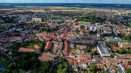 An aerial panorama view of the old town around the city Wolmirstedt in Germany on a summer day.