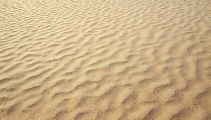 Sand texture on a beach with natural patterns and fine grains. Ideal for nature and relaxation-related projects.