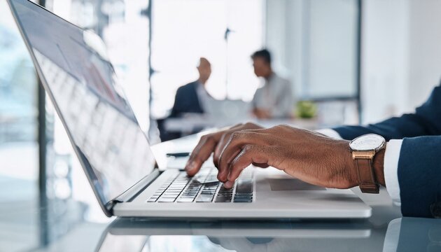 Financial Risk Evaluation: African Underwriter Using Laptop for Client Reports