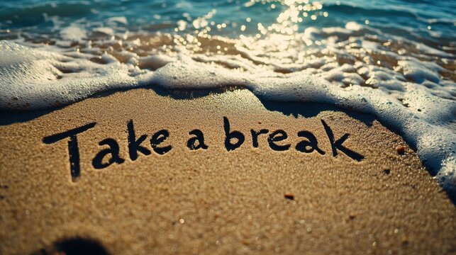 Beach background travel concept "Take a break" written by hand on a sandy beach.