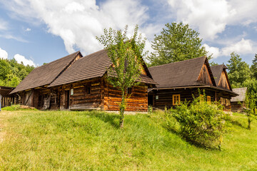 Wooden village houses in the open air museum (Valasske muzeum v prirode) in Roznov pod Radhostem, Czechia