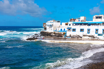 El Cotillo coastal town in Fuerteventura, Canary Islands. Serene beach scene with gentle waves...