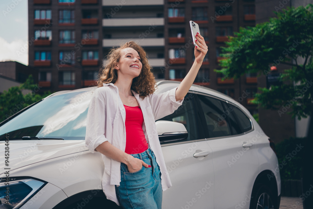 Canvas Prints Photo of excited dreamy lady lean on car take selfie photo wear white shirt walking outside modern urban city street