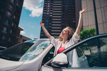 Photo of shiny excited lady driver dressed white shirt smiling riding car going repair station...