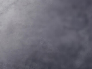 A moody and dark textured background with subtle gradients and cloud-like formations, perfect for various design applications.