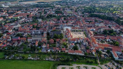 An Aerial panorama view around the old town of the city Haldensleben on an early summer day in...