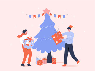 A-couple-decorating-Christmas-tree-with-gifts-and-wreath