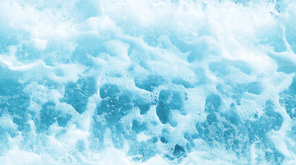 Fototapeta premium breaking wave texture with foamy crest and water droplets