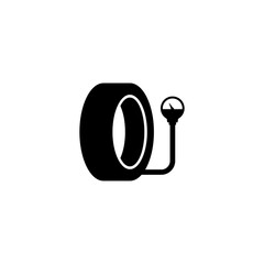 Black vector icon of tire with pressure gauge for car maintenance.