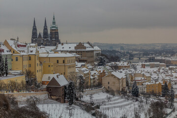 Obraz premium Winter aerial view of Prague castle and Mala strana (Lesser quartier) in Prague, Czech Republic
