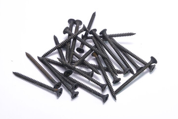 Drywall screws isolated on white background. Construction hardware