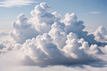 White fluffy clouds form a majestic scene in a blue sky.