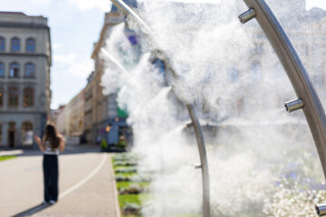 Cooling outdoor shower, combating overheating in extreme heat in Europe