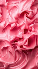 Obraz premium Close-Up of Swirling Pink Cream or Frosting with Artistic Texture Pattern for Background