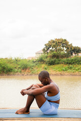 Yoga stretch and meditation outdoors in the countryside