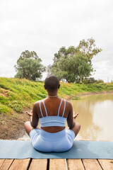 Yoga stretch and meditation outdoors in the countryside