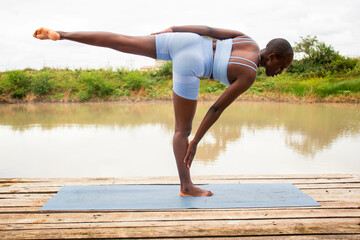 Yoga stretch and meditation outdoors in the countryside