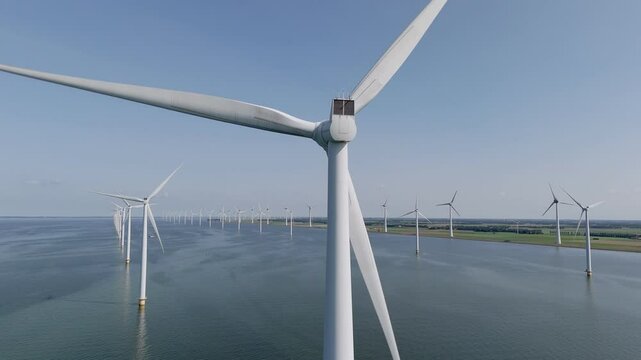 Aerial Close View of a Wind Turbine in IJsselmeer Near Urk, Netherlands, Low Wind